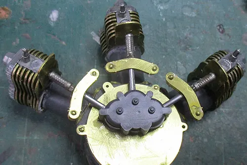 Close-up of the firewall side of the air-cooled engine on a Blériot XI model, showing mounting points and structural detail