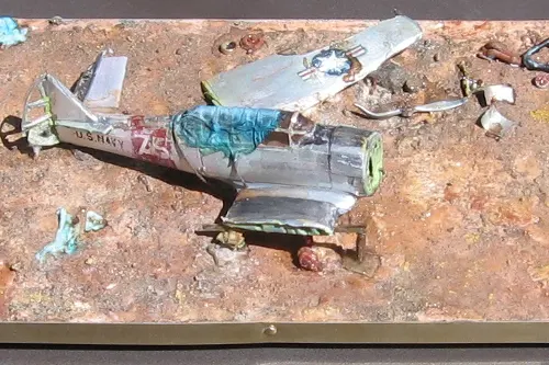 A close up on Rich's original model of a United States Navy SNJ crash site.